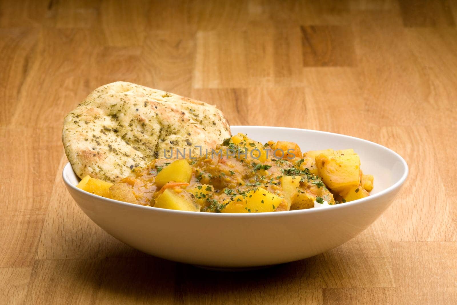 An Indian meal - Potato curry with Lentis and Naan bread