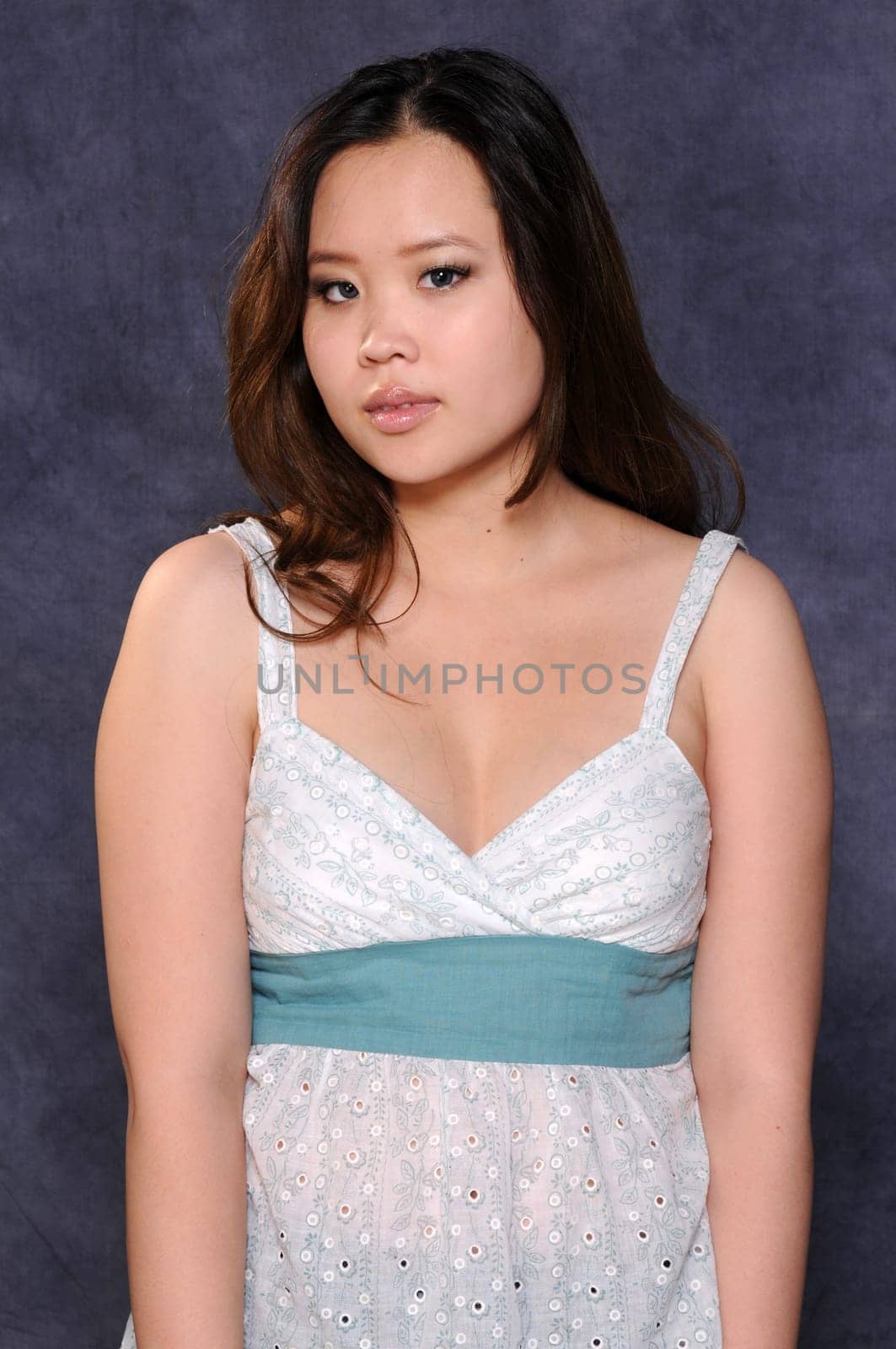 Pretty asian girl in a white top