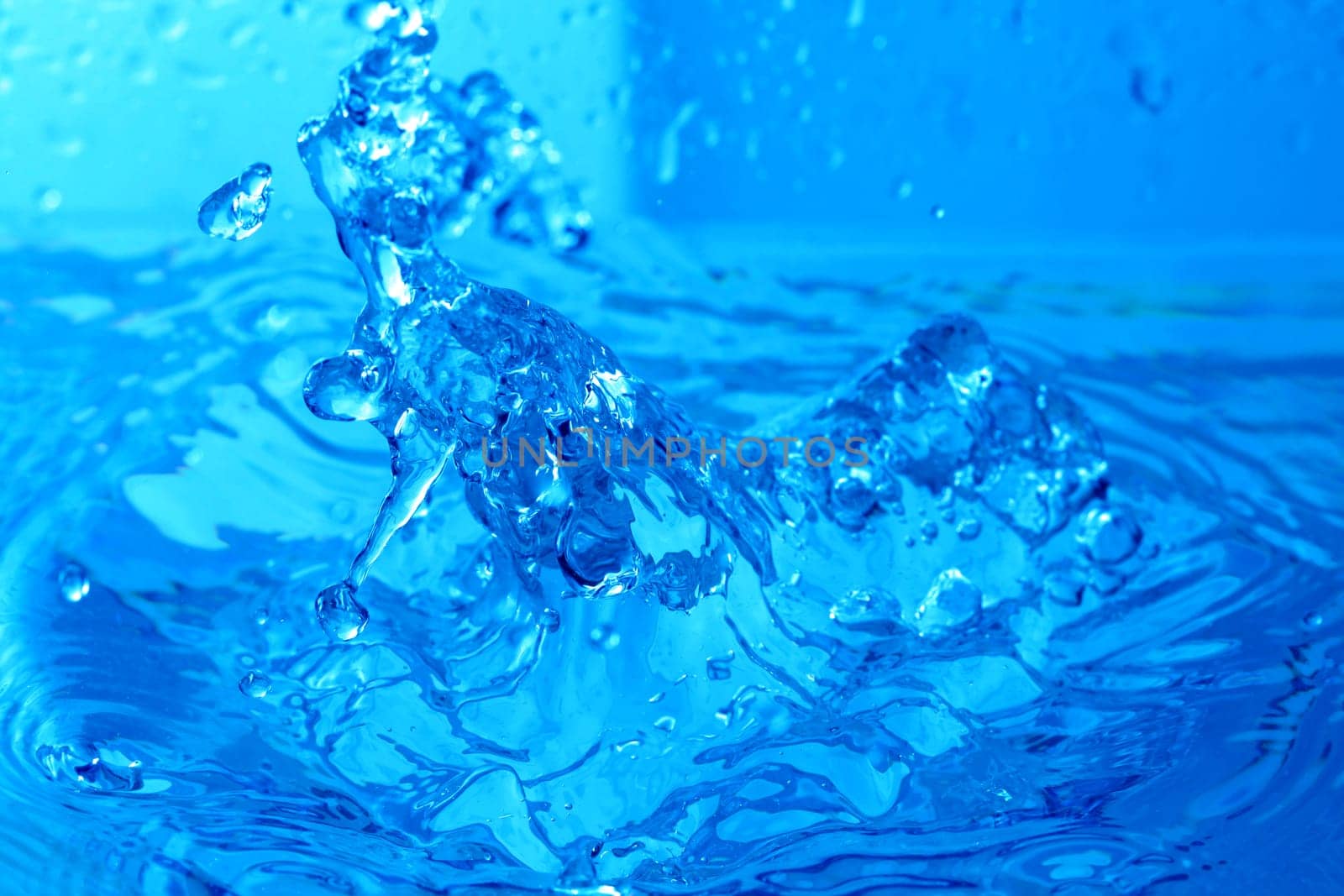 blue water splash macro close up