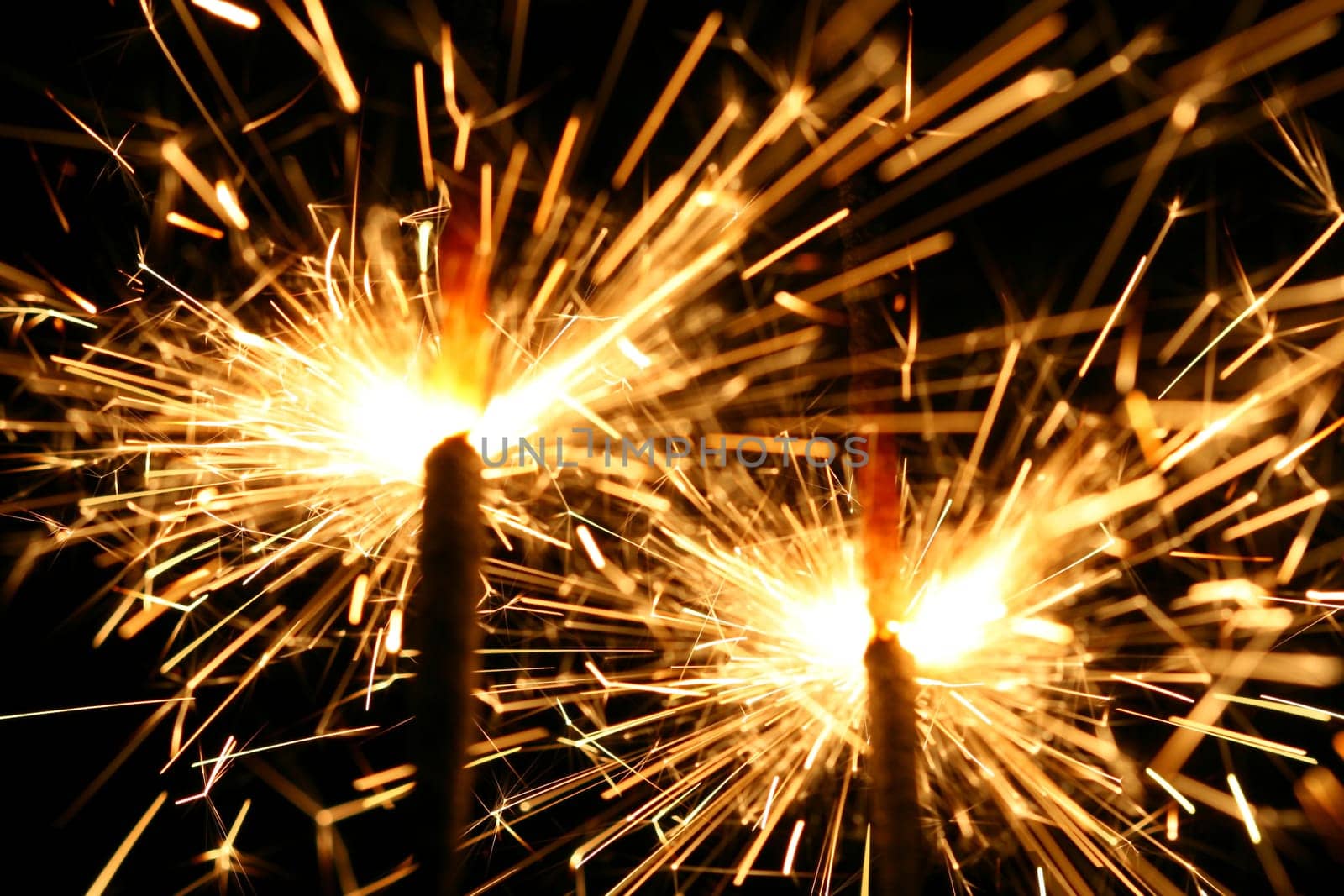 christmas celebration sparklers on black background