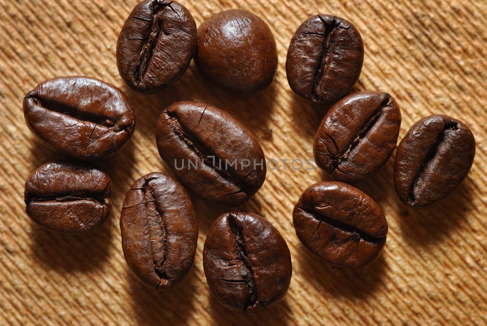 roasted coffee beans.brown color background