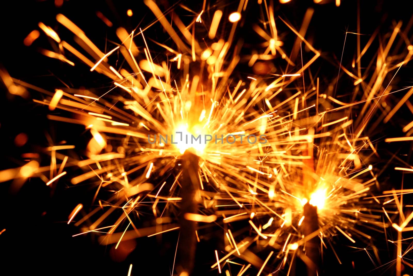 christmas celebration sparklers on black background
