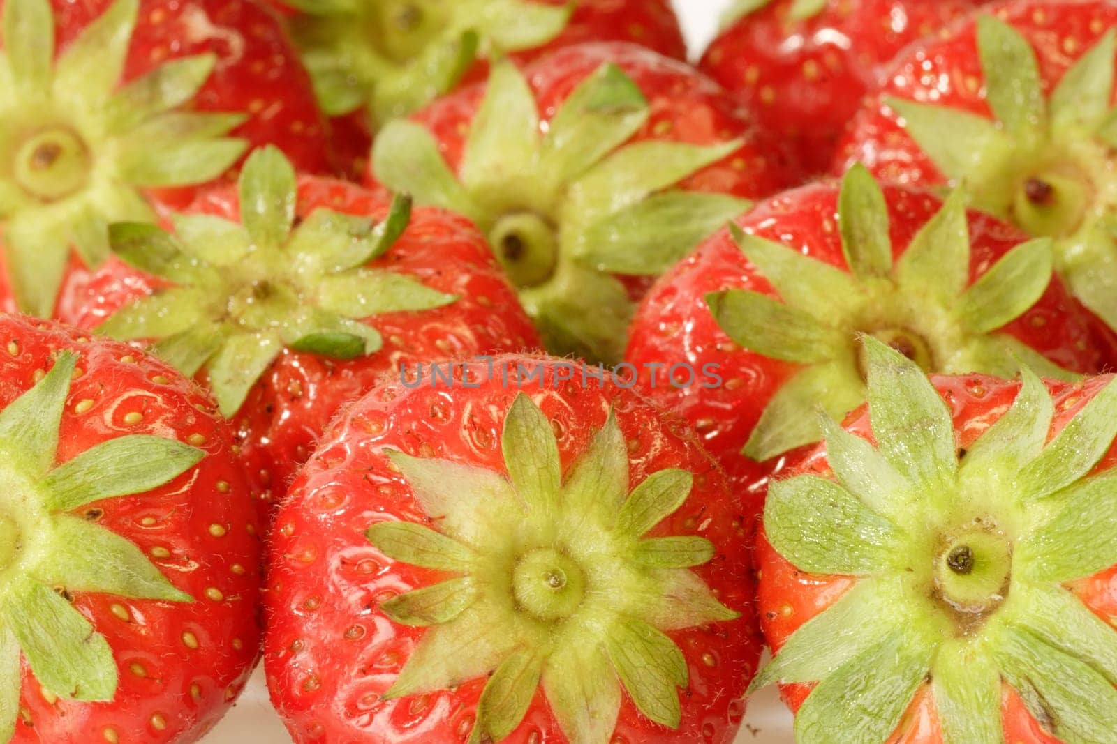 Close-up of fresh strawberries als background