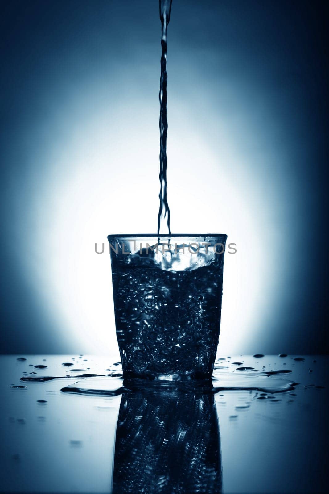 alcohol splash on gray background