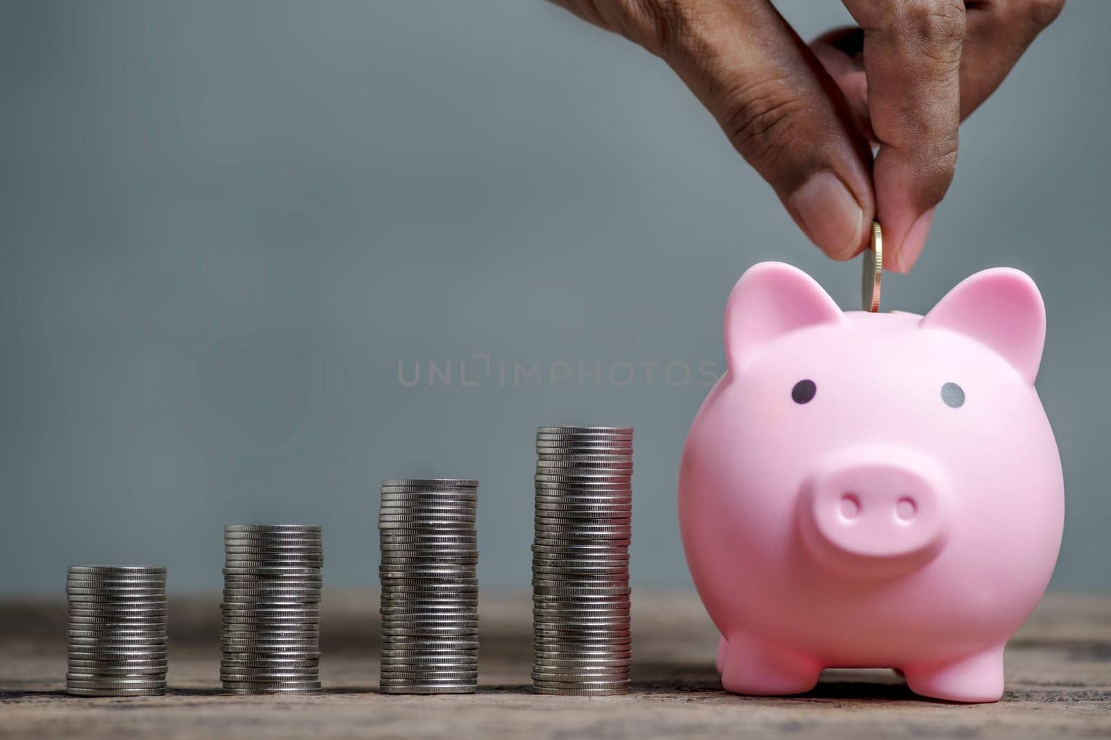 Save money and account banking for finance concept, Piggy bank with coin on blurred background, Save Monney for Investors Using Internet to Trade Stocks or Trade Fund