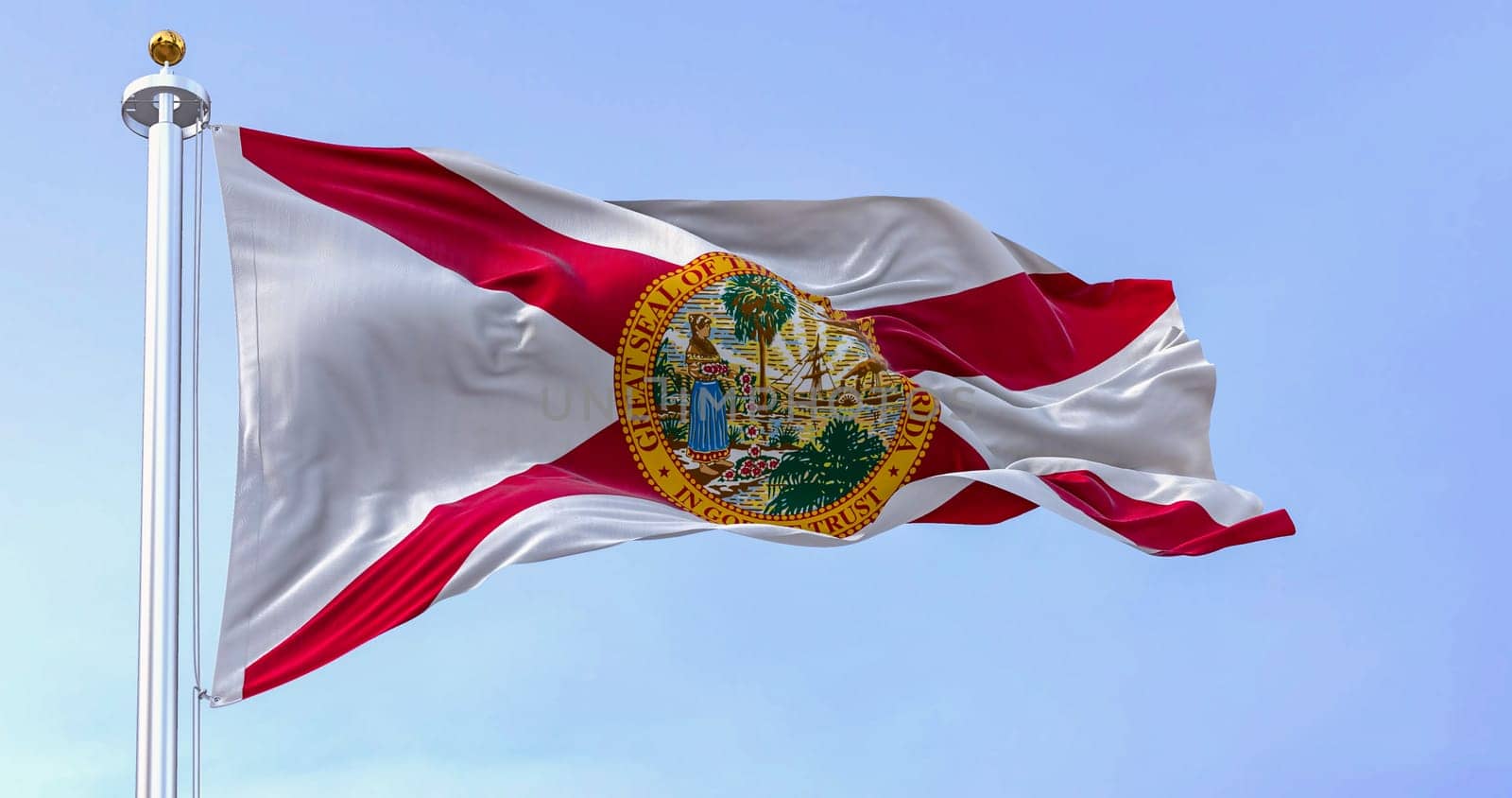 Close-up view of the Florida state flag waving in the wind on a clear day. Red saltire on white with the state seal in the center. 3d illustration render. Fluttering textile.