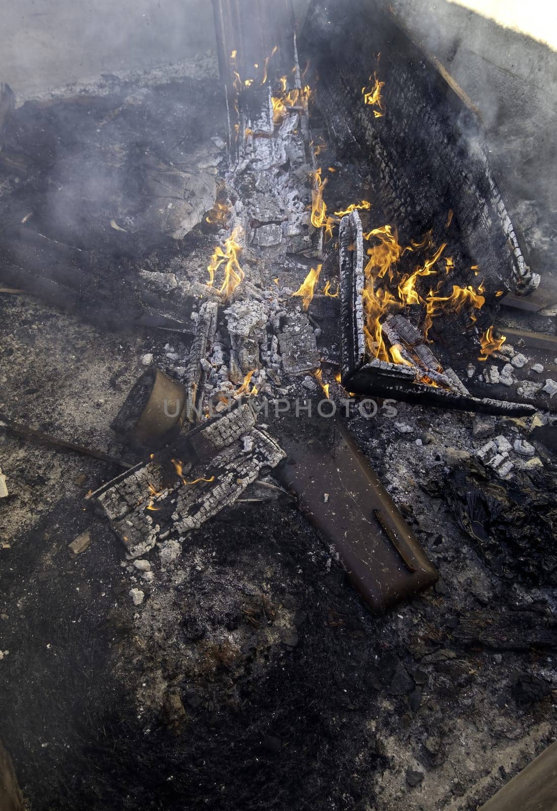 Detail of wood burning with fire and flames, destruction