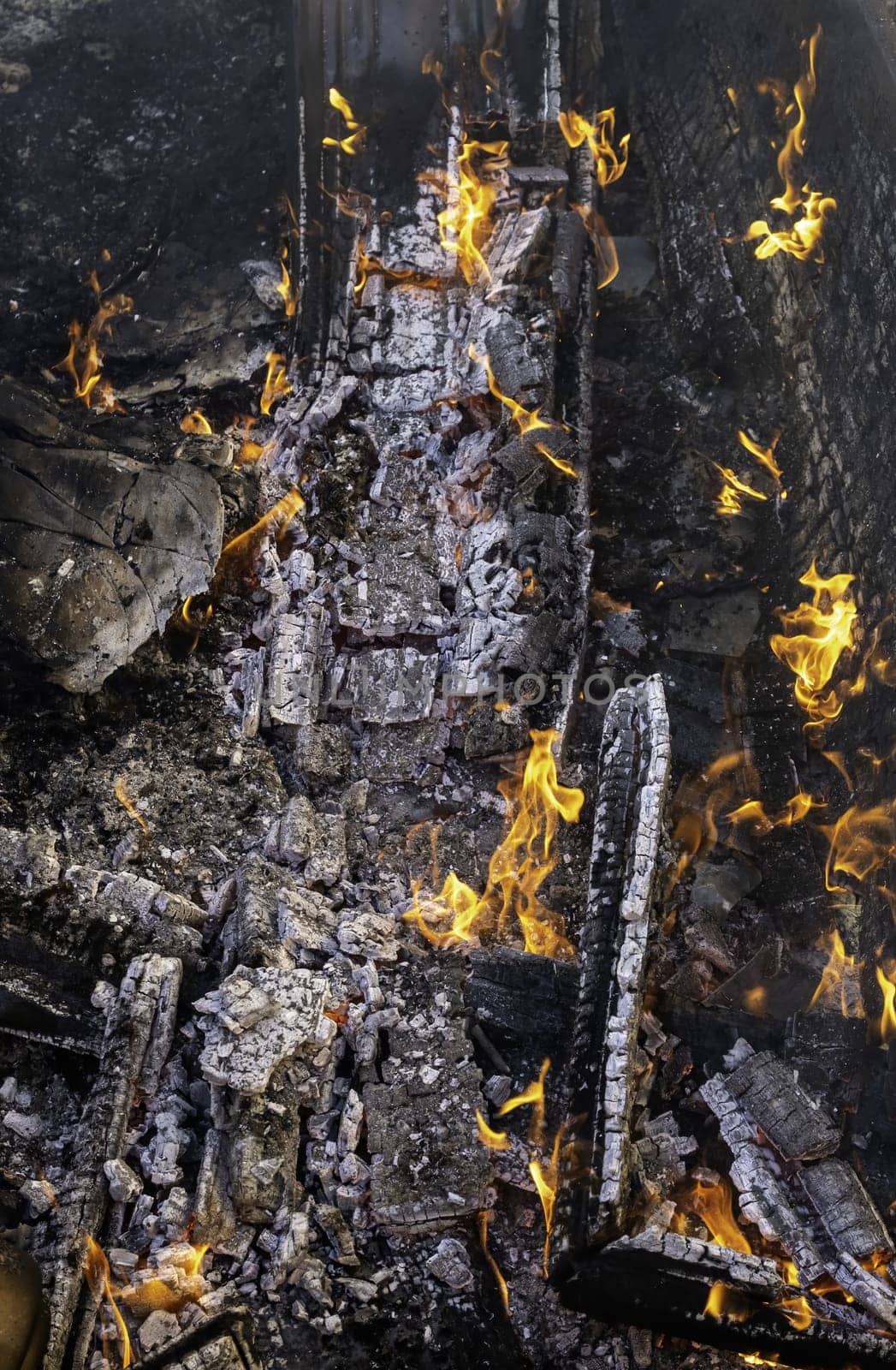 Detail of wood burning with fire and flames, destruction