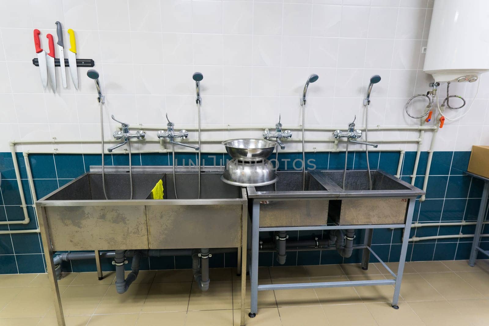 Restaurant kitchen equipment for preparing food, meal, plates, details.