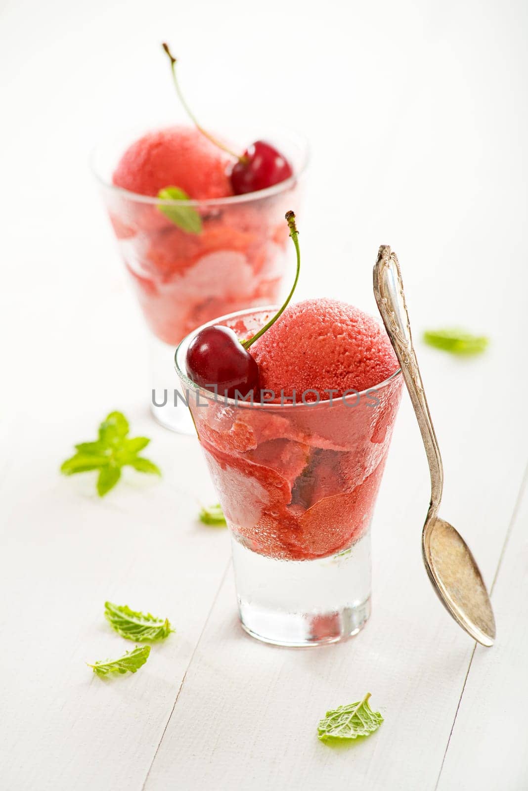 Fresh fruit ice cream sorbet in white bowl.