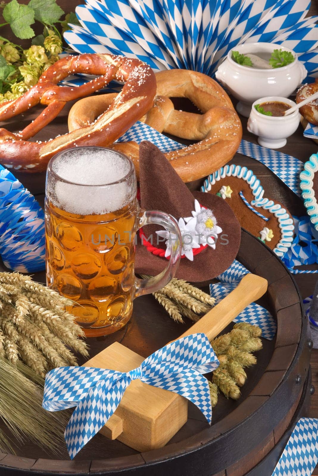 All typical Bavarian dishes in one picture. Pretzels,gingerbread,white sausage,obazda and beer.
