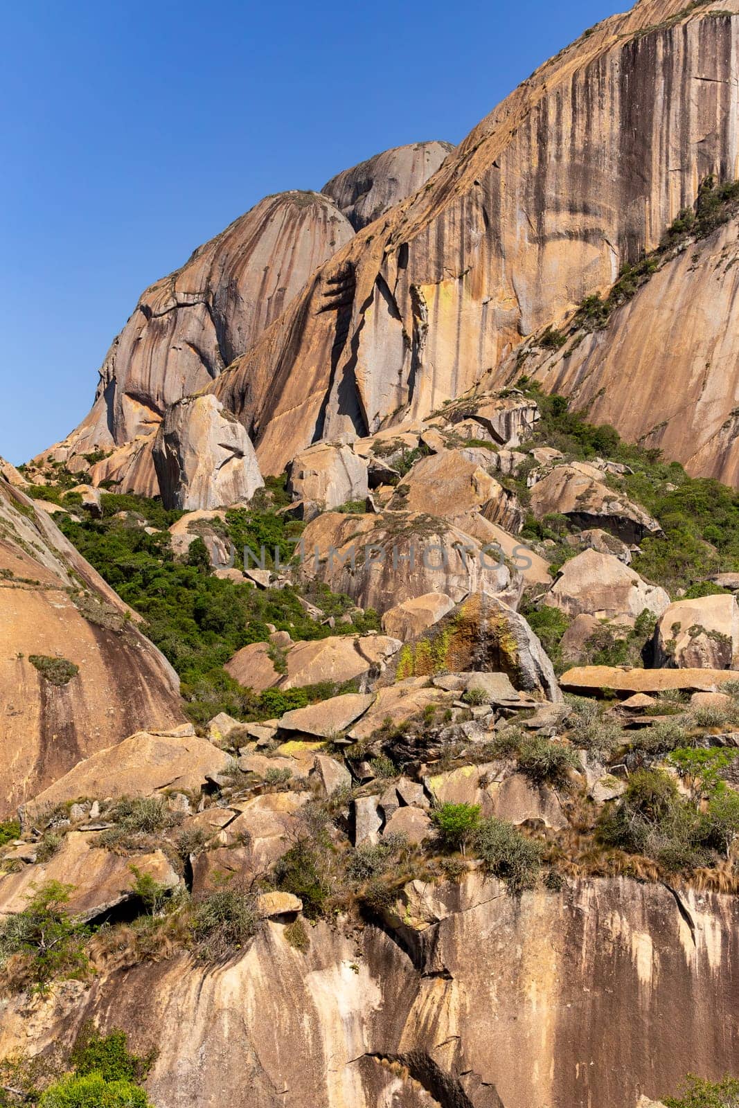 Stunning mountain landscape in the Anja Community Reserve, Madagascar, with vibrant flora and fauna. Nature, travel, adventure, outdoors, hiking, biodiversity. Madagascar wilderness mountain landscape