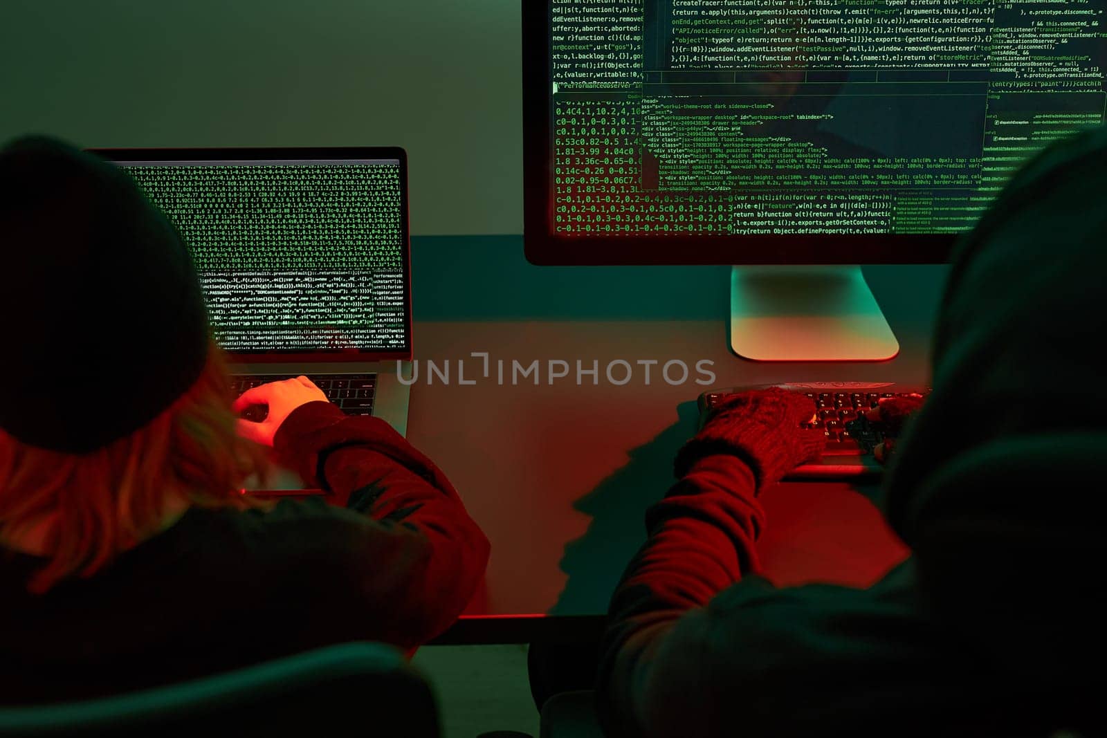 Anonymous people using computer and programming to break code. Cyber security threat. Internet and network security. Access to private information. Anonymous hackers using technology to access to password and encrypted data. Cyber attack