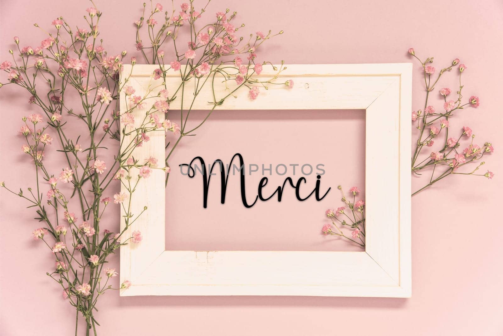 Vintage Photo Frame With Ikebana Flower Arrangement With French Text Merci Means Thank You. Retro Pastel Background
