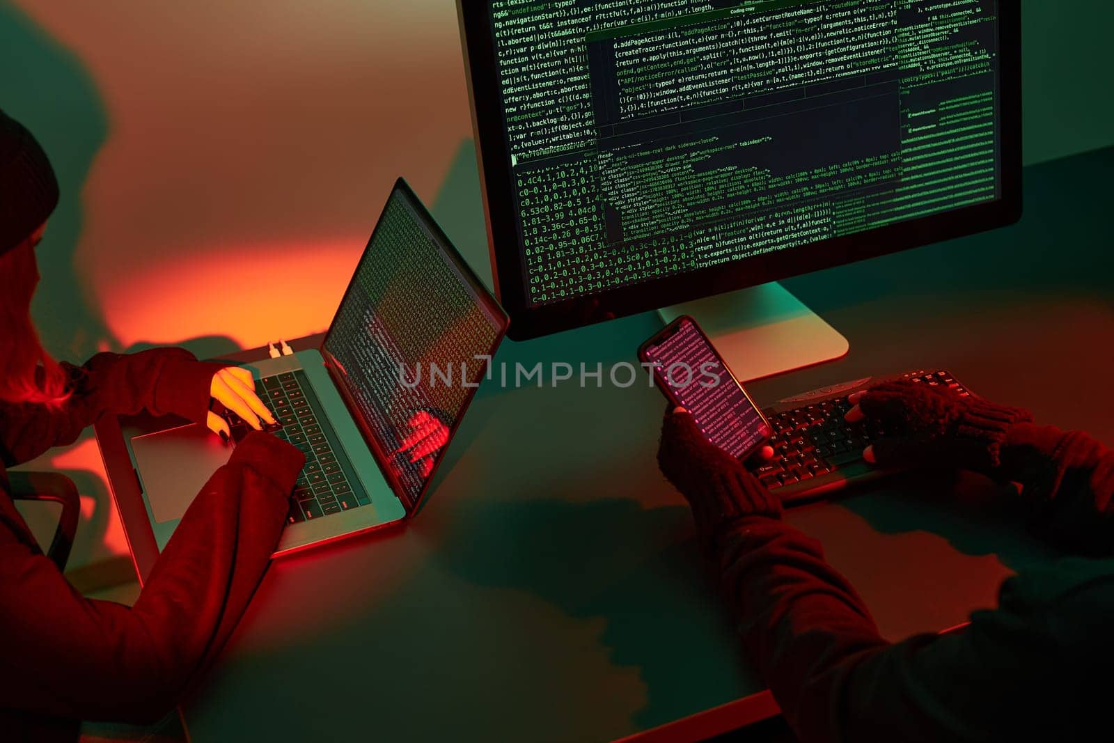 Anonymous people using computer and programming to break code. Cyber security threat. Internet and network security. Access to private information. Anonymous hackers using technology to access to password and encrypted data. Cyber attack