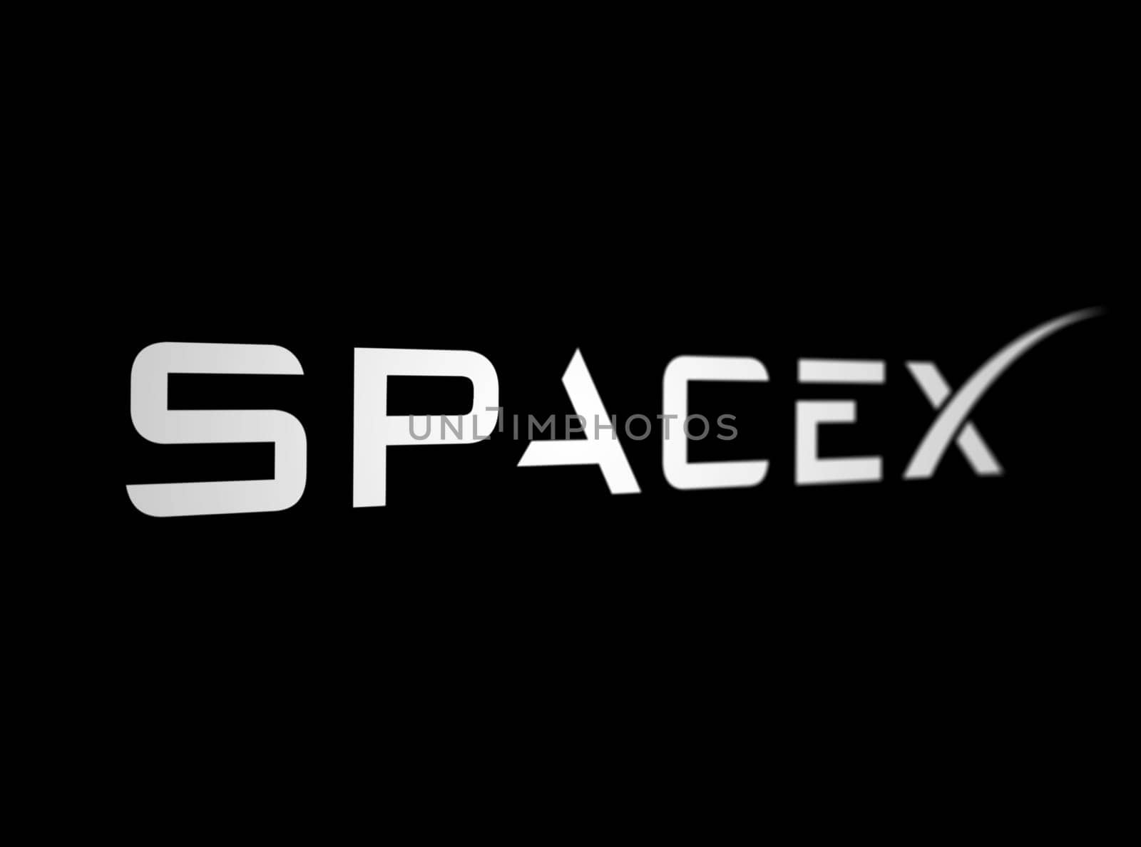 New York City, US, March 2023: White SpaceX logo on a black background. SpaceX is a private company that designs and manufactures space launch vehicles. Illustrative editorial. Financial and economics