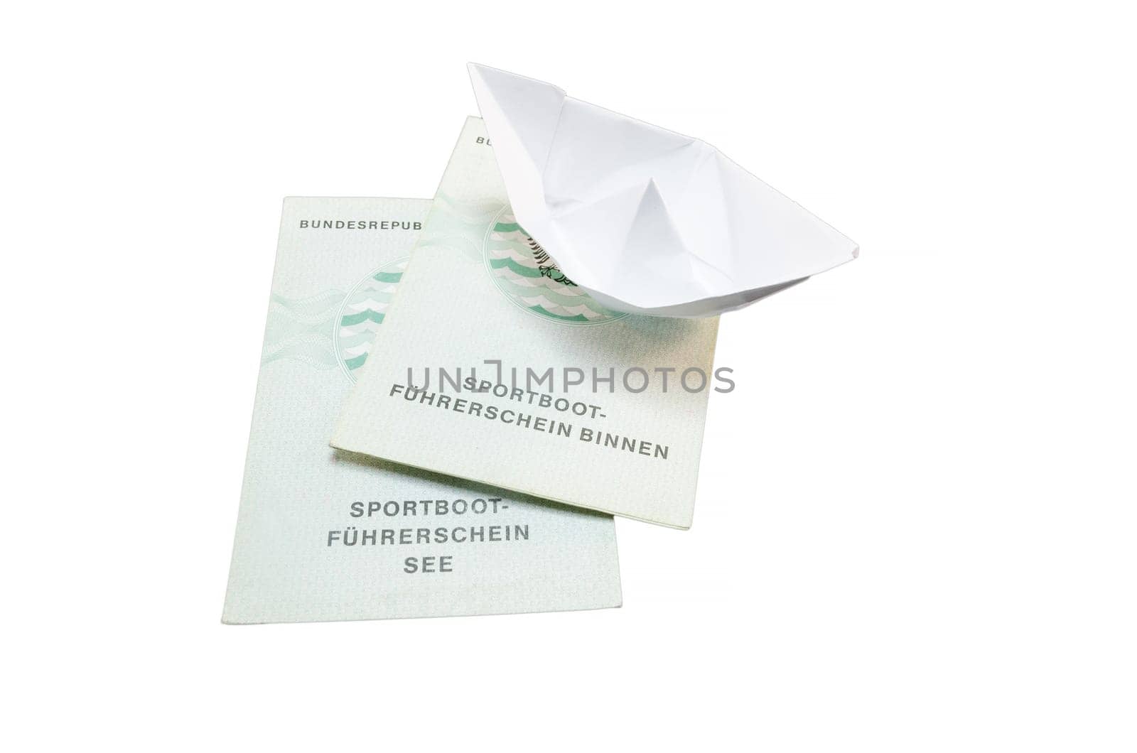 Document of the German boat driving licence lake. With small paper ship as a symbol..