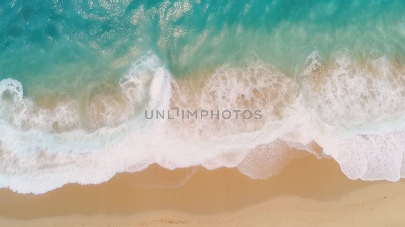 This stunning aerial photograph captures the beauty of the ocean waves and the beach from a top-down perspective. The crystal clear blue waters contrast with the golden sand, creating a beautiful natural background for summer vacation holidays.