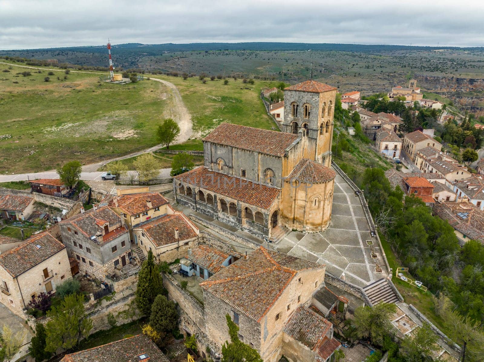 Church of El Salvador in Sepulveda, province of Segovia, view of the apse and side porticos