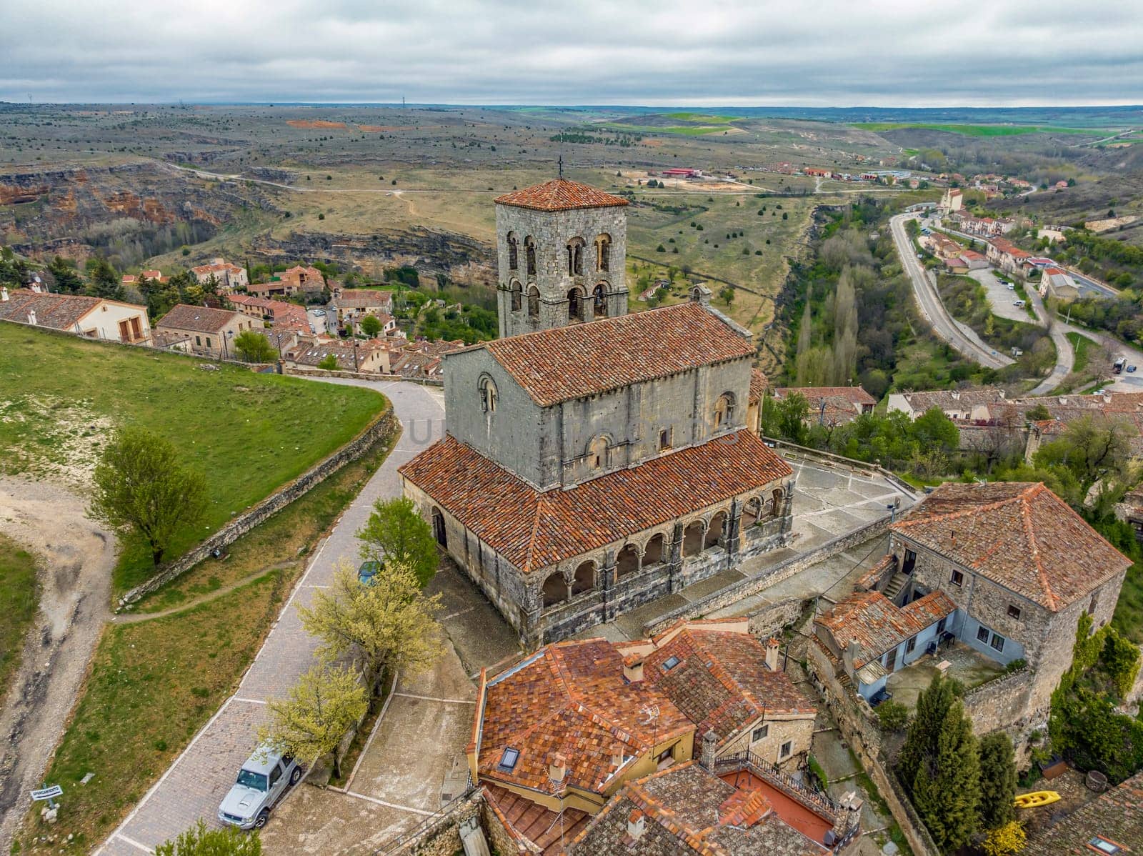 Church of El Salvador in Sepulveda province of Segovia view facade and side porticos