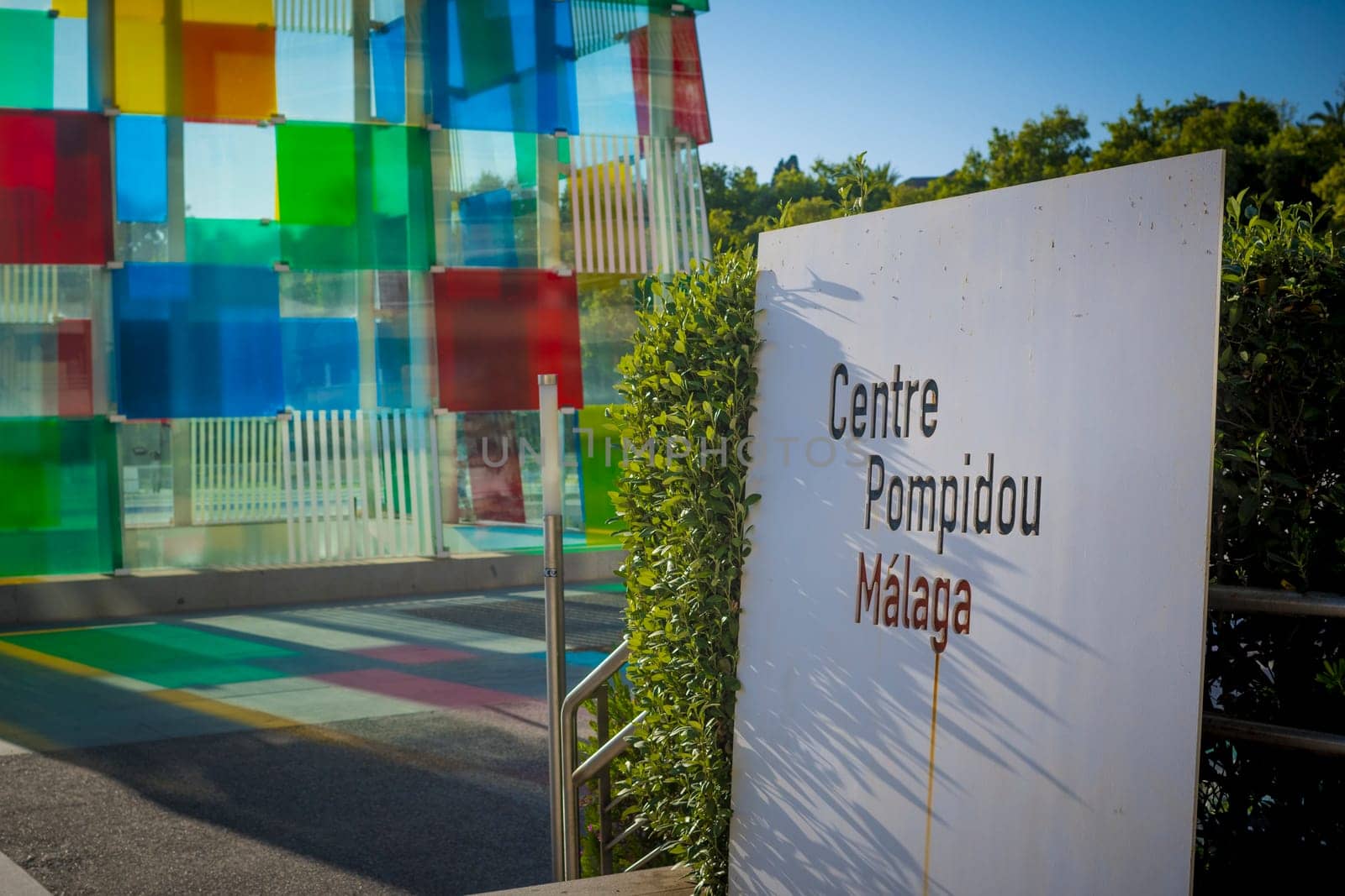 Malaga, Spain, April 2023: Closeup of Centre Pomidou in Malaga with colorful glass of the cube in the background.