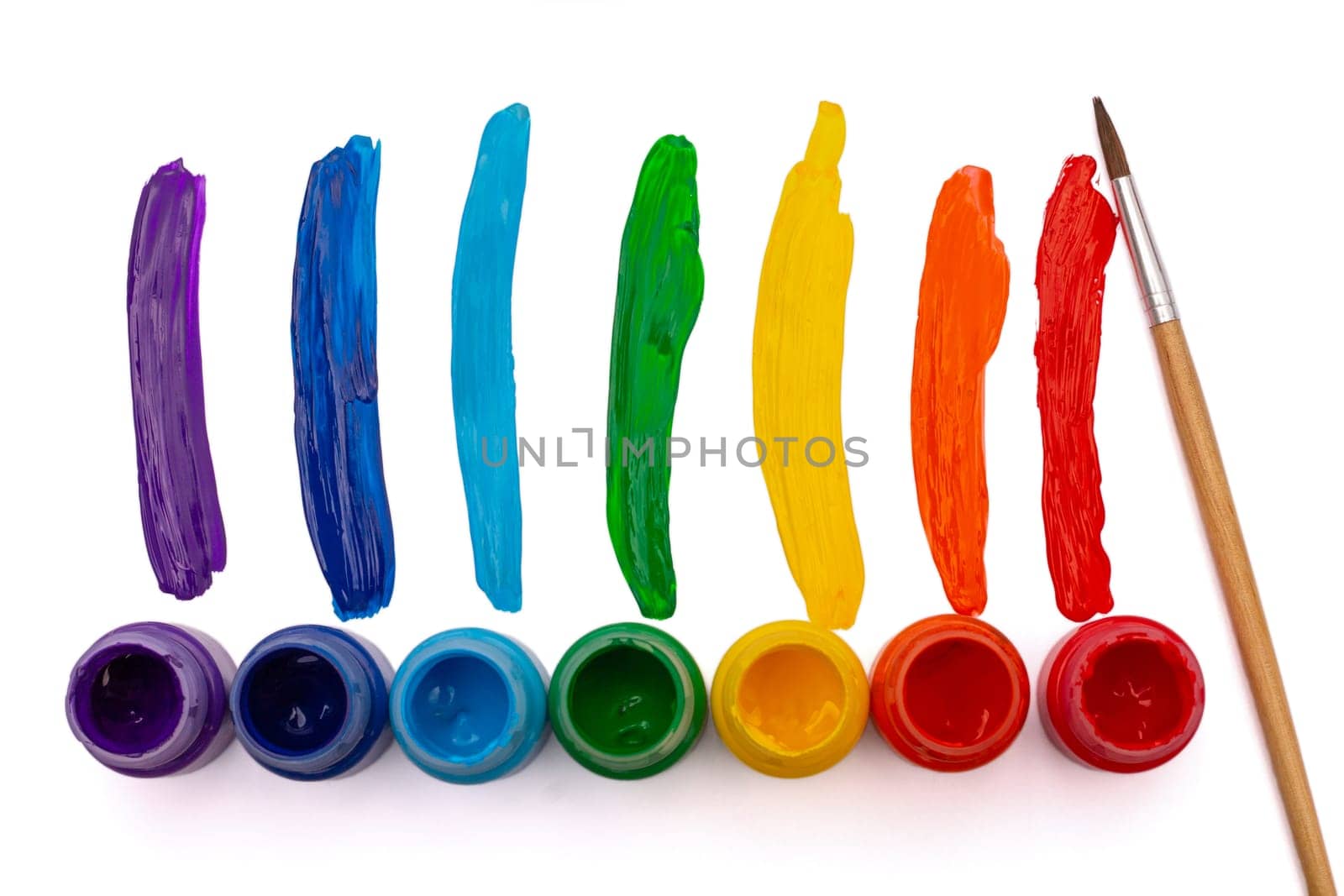 Jars with rainbow colors isolated on white background. Top view