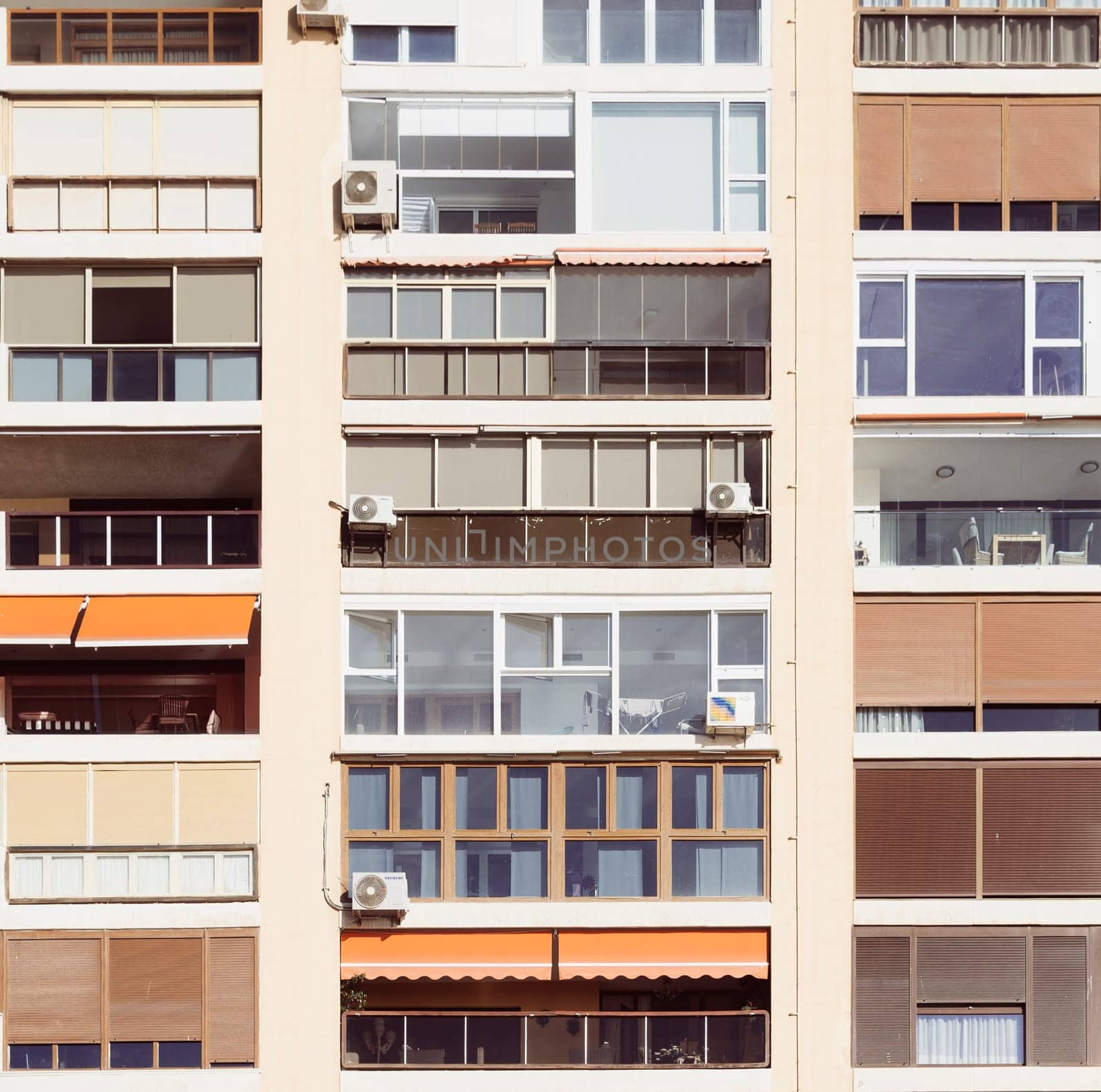 Malaga, Spain, April 2023: Front view of generic high-rise apartment building