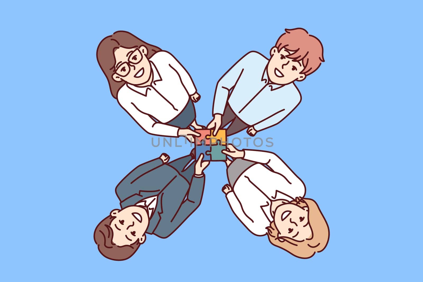 Friendly business people hold together puzzle symbolizing consolidation and synergy in performance of corporate tasks. Top view of men and women collaborating to increase business profits