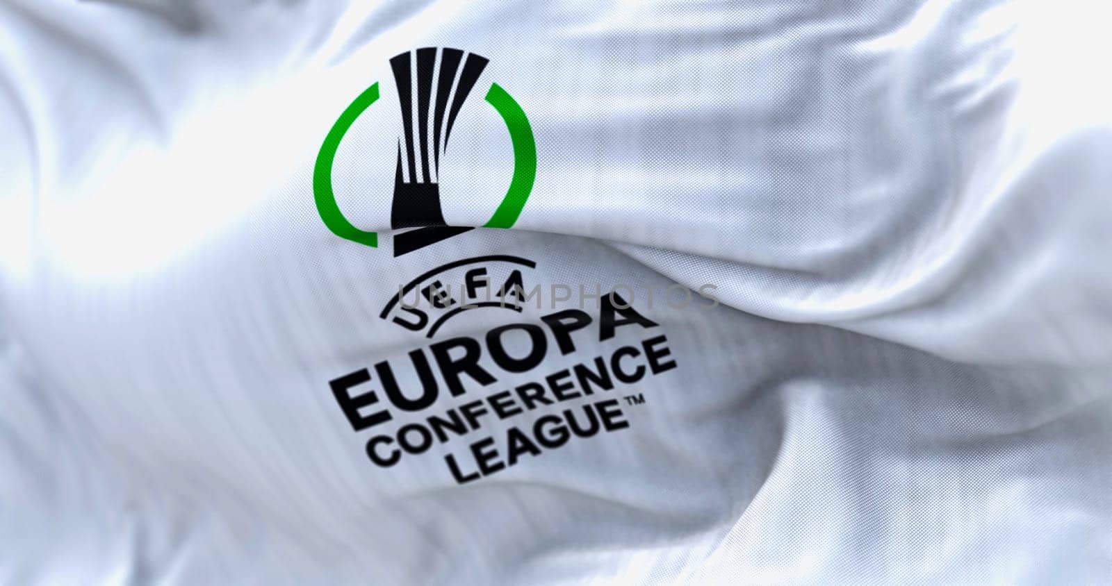 Prague, CZ, Apr. 2023: UEFA Europa Conference League flag waving. Europa Conference League is an annual football club competition for european clubs. illustrative editorial 3D illustration render