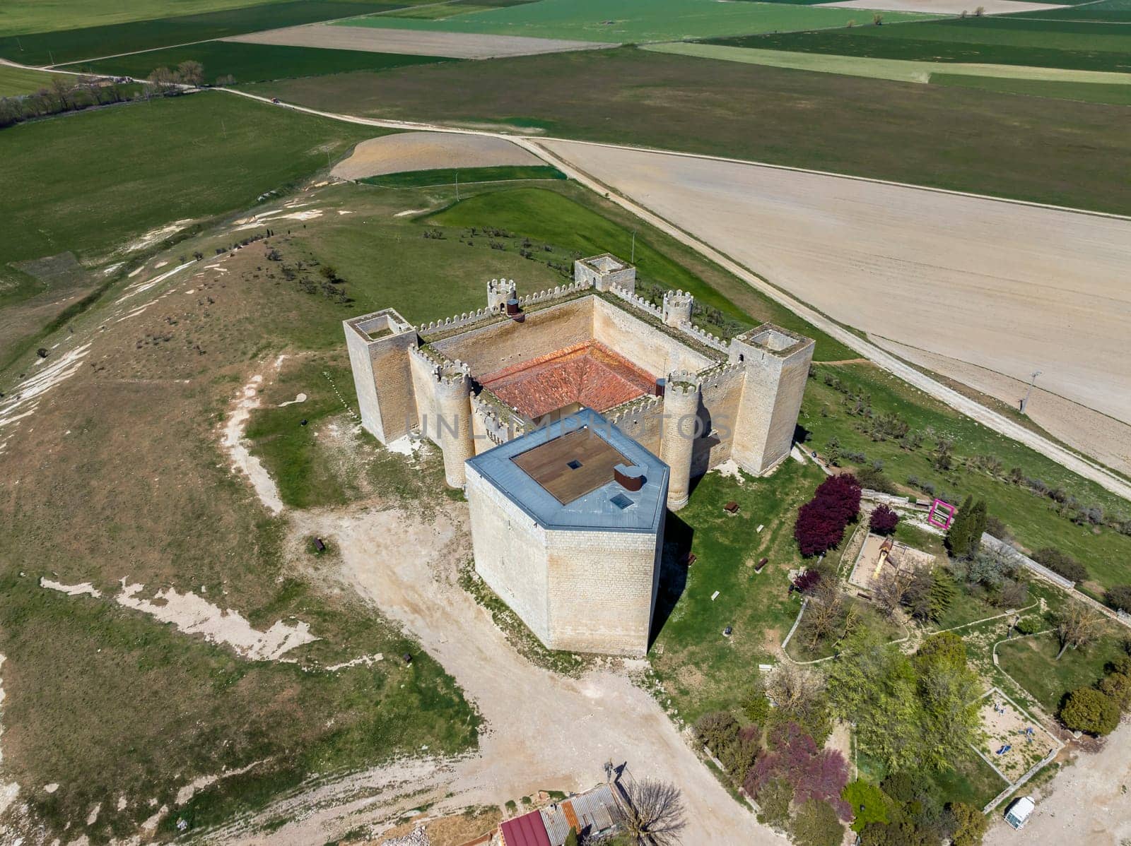Montealegre de Campos castle is located in Castilla y Leon Spain close to the city of Valladolid. It is a medieval castle still keeping its high defensive walls