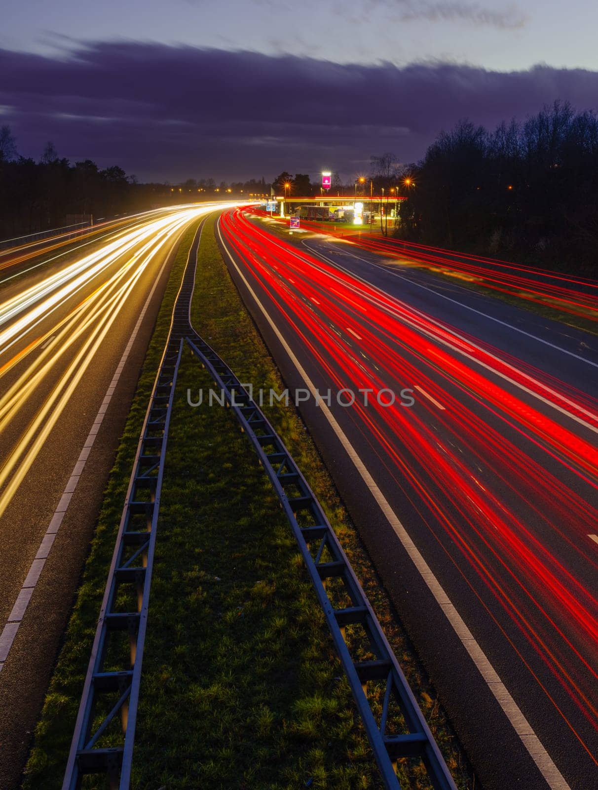 OLDENZAAL, NETHERLANDS - MARCH 24, 2023: Long exposure shot of traffic on the E30 highway from Amsterdam to Berlin.