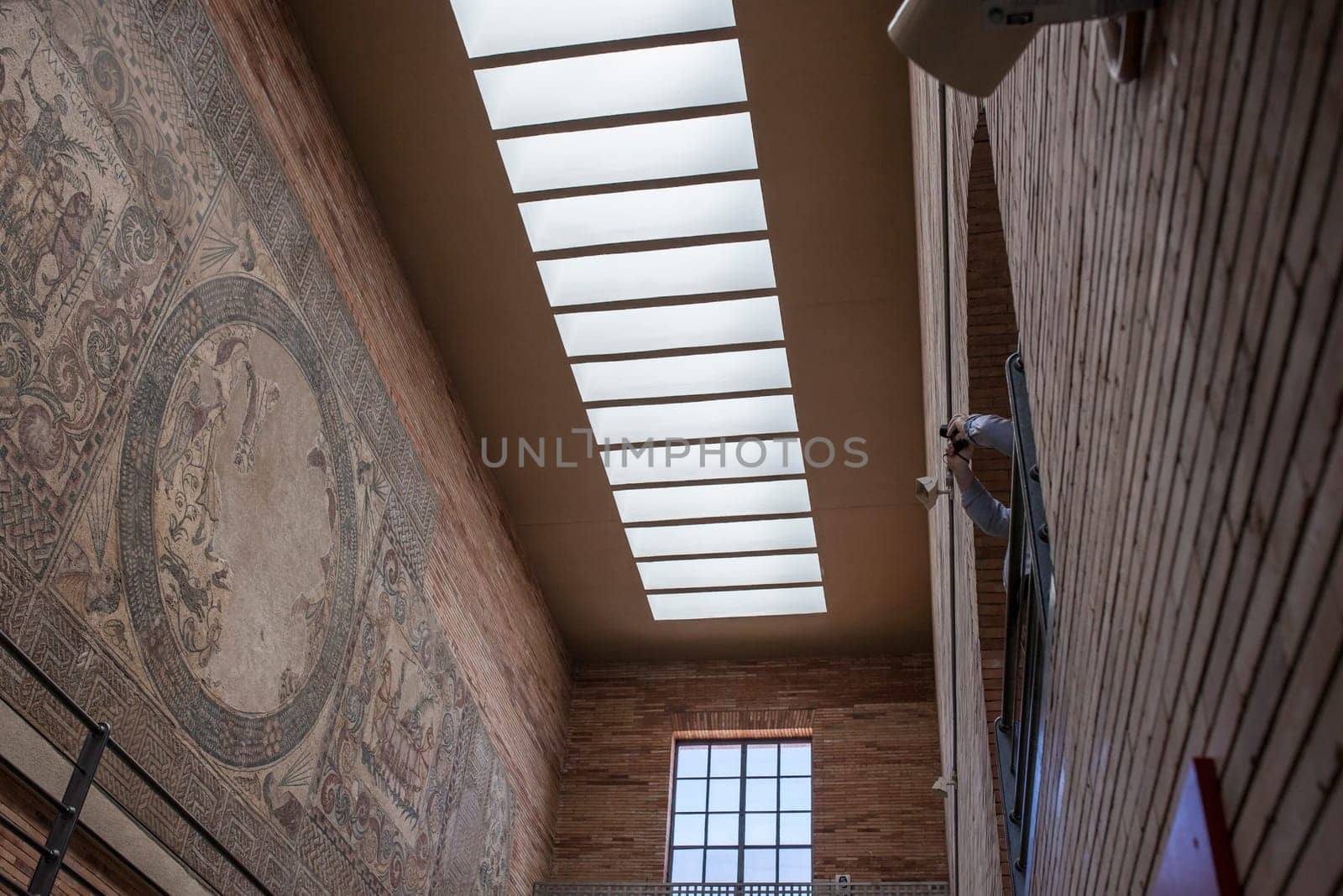 Merida, Spain - May 23th, 2021: Visitor taking pictures at National Museum of Roman Art in Merida, Spain
