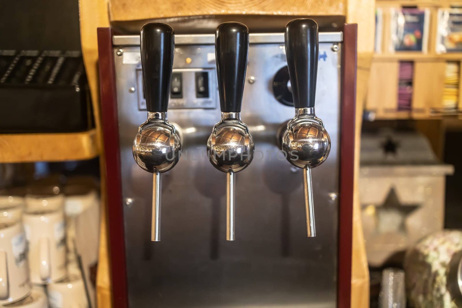 Taps of a tap for pouring mulled wine at a christmas market.