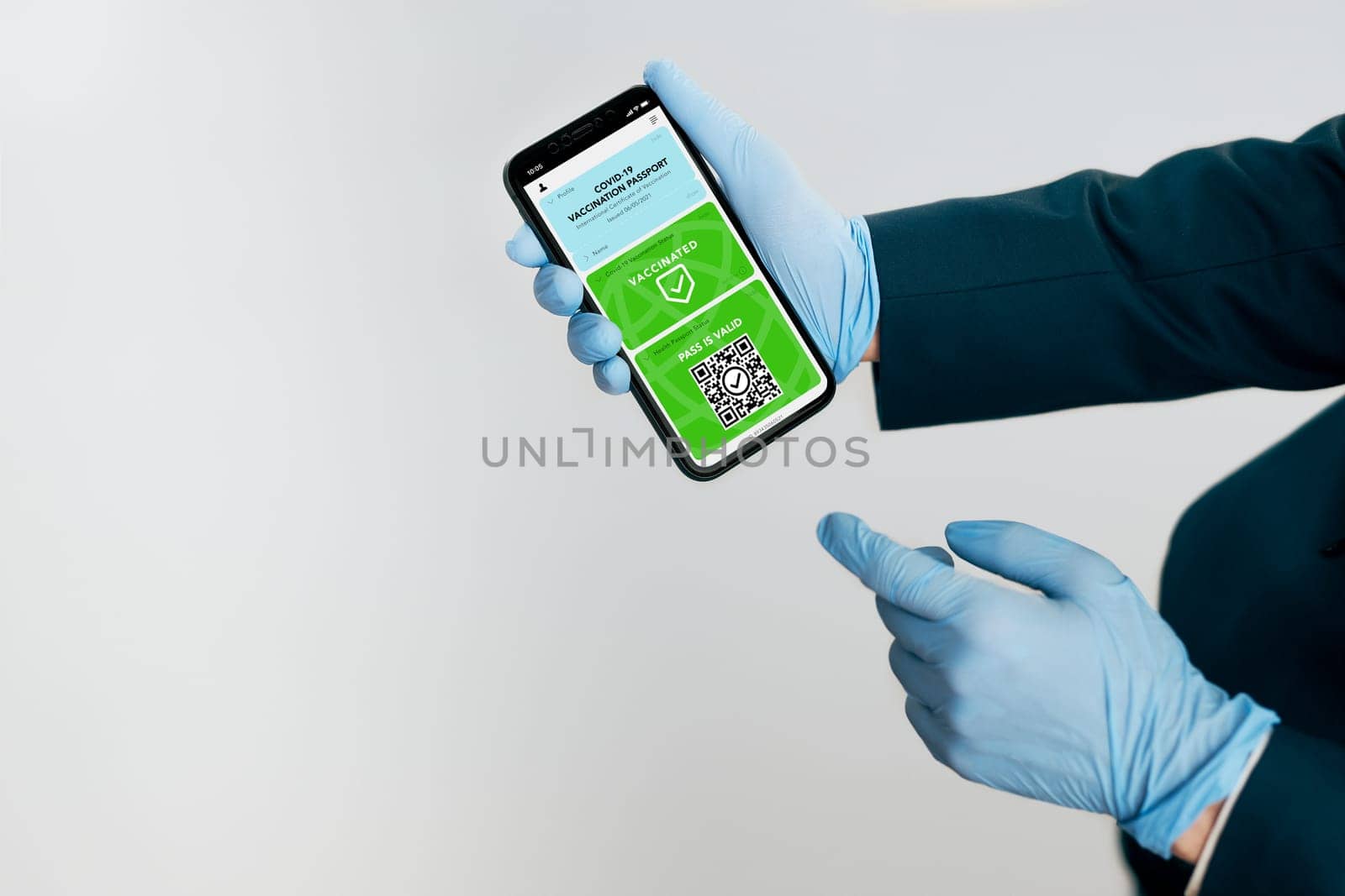 Digital covid certificate. Covid negative rapid digital test pass. Woman passenger holding digital medical pass on her mobile phone, passport and airplane ticket. Traveler showing digital covid test result as medical pass for travel during covid-19 pandemic