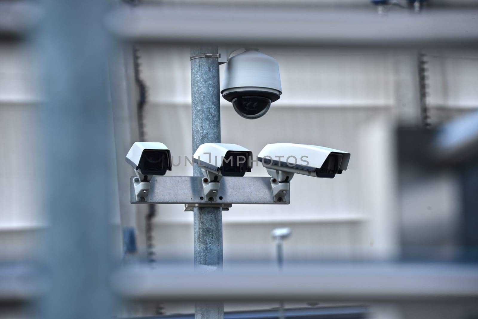 High tech overhead security camera system installed in guarded industrial area.
