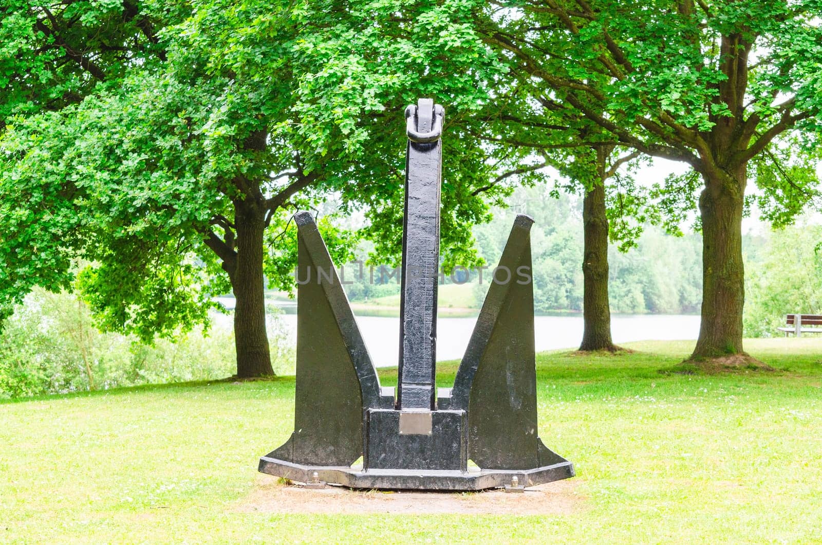 Age of large black ship anchors in a public park in Ratingen.