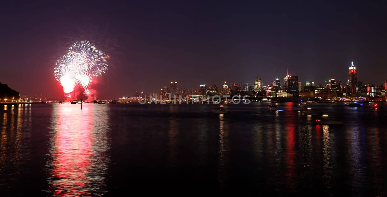 NEW YORK - JULY 4: The largest  fireworks in the country displayed over the Hudson River - the Macy's 4th of July fireworks on July 4, 2010 in New York City.