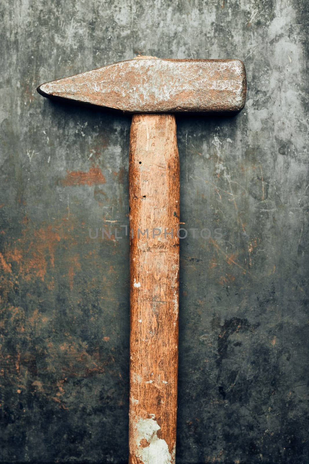Old hammer on steel surface. Tool for maintenance. Hardware tool to fix. Technical background with copy space