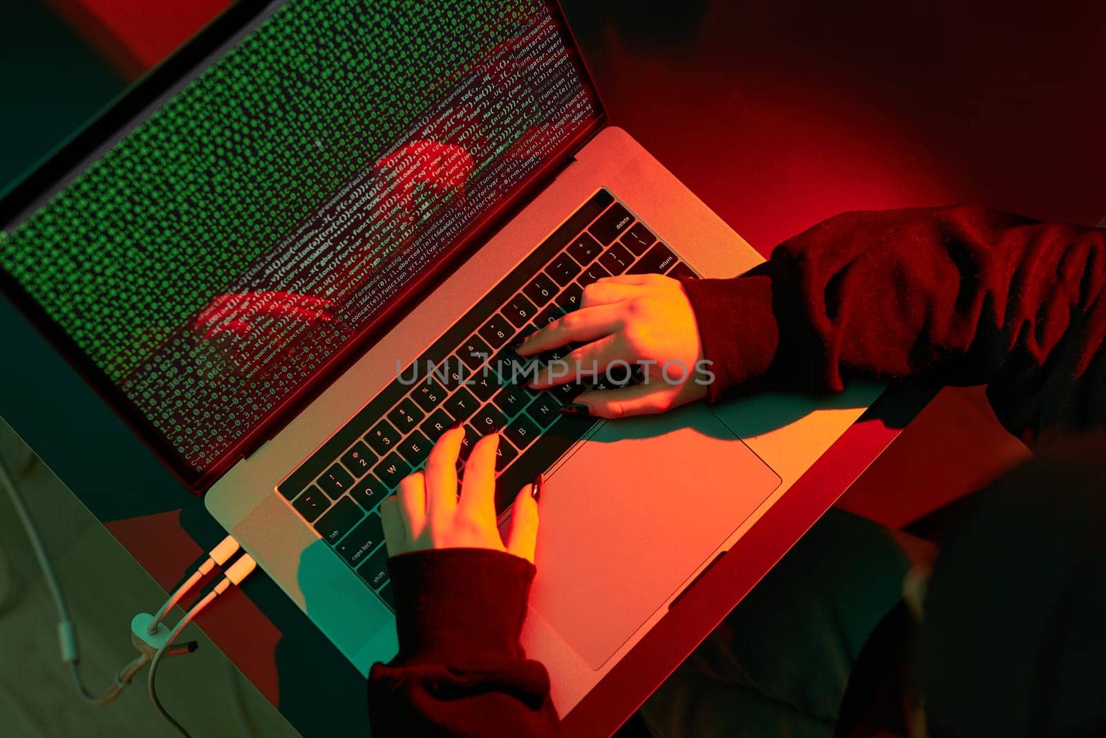 Anonymous people using computer and programming to break code. Cyber security threat. Internet and network security. Access to private information. Anonymous hackers using technology to access to password and encrypted data. Cyber attack