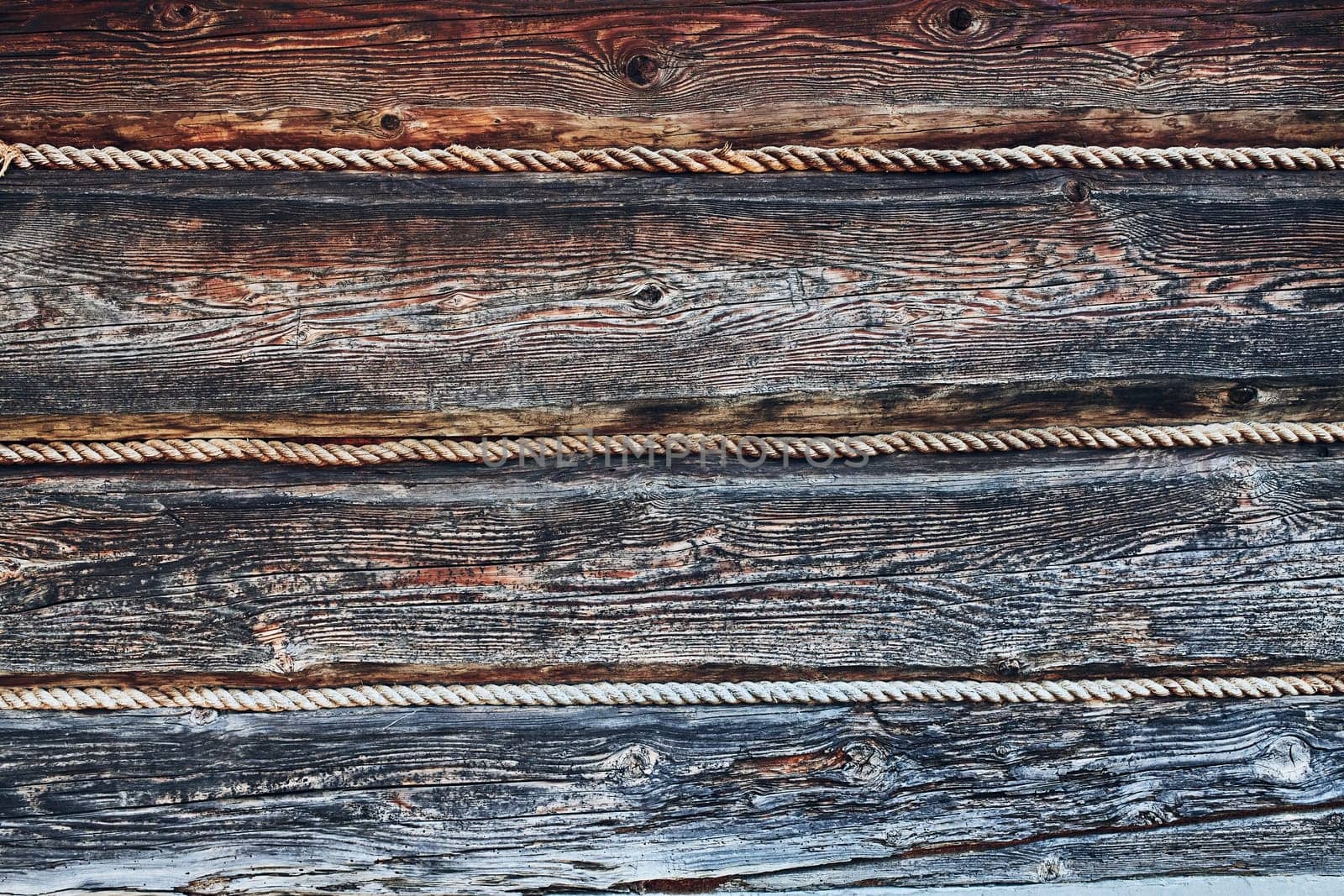 Old rustic rough wood background. Old house wall. Vintage backdrop