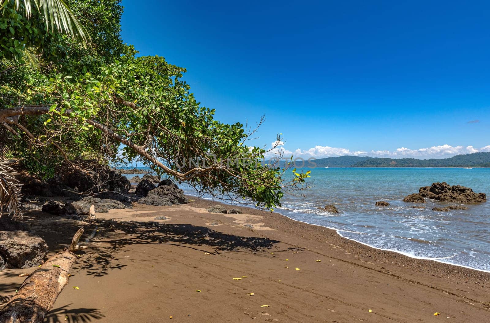 Sandy beach of the small town of Drake Bay, Puntarenas, Costa Rica