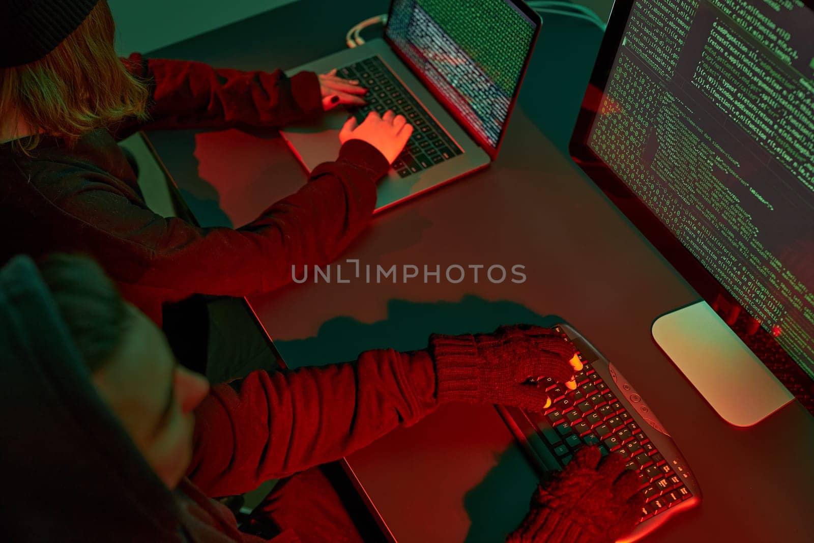 Anonymous people using computer and programming to break code. Cyber security threat. Internet and network security. Access to private information. Anonymous hackers using technology to access to password and encrypted data. Cyber attack