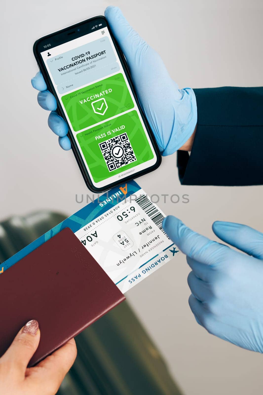 Digital covid certificate. Covid negative rapid digital test pass. Woman passenger holding digital medical pass on her mobile phone, passport and airplane ticket. Traveler showing digital covid test result as medical pass for travel during covid-19 pandemic