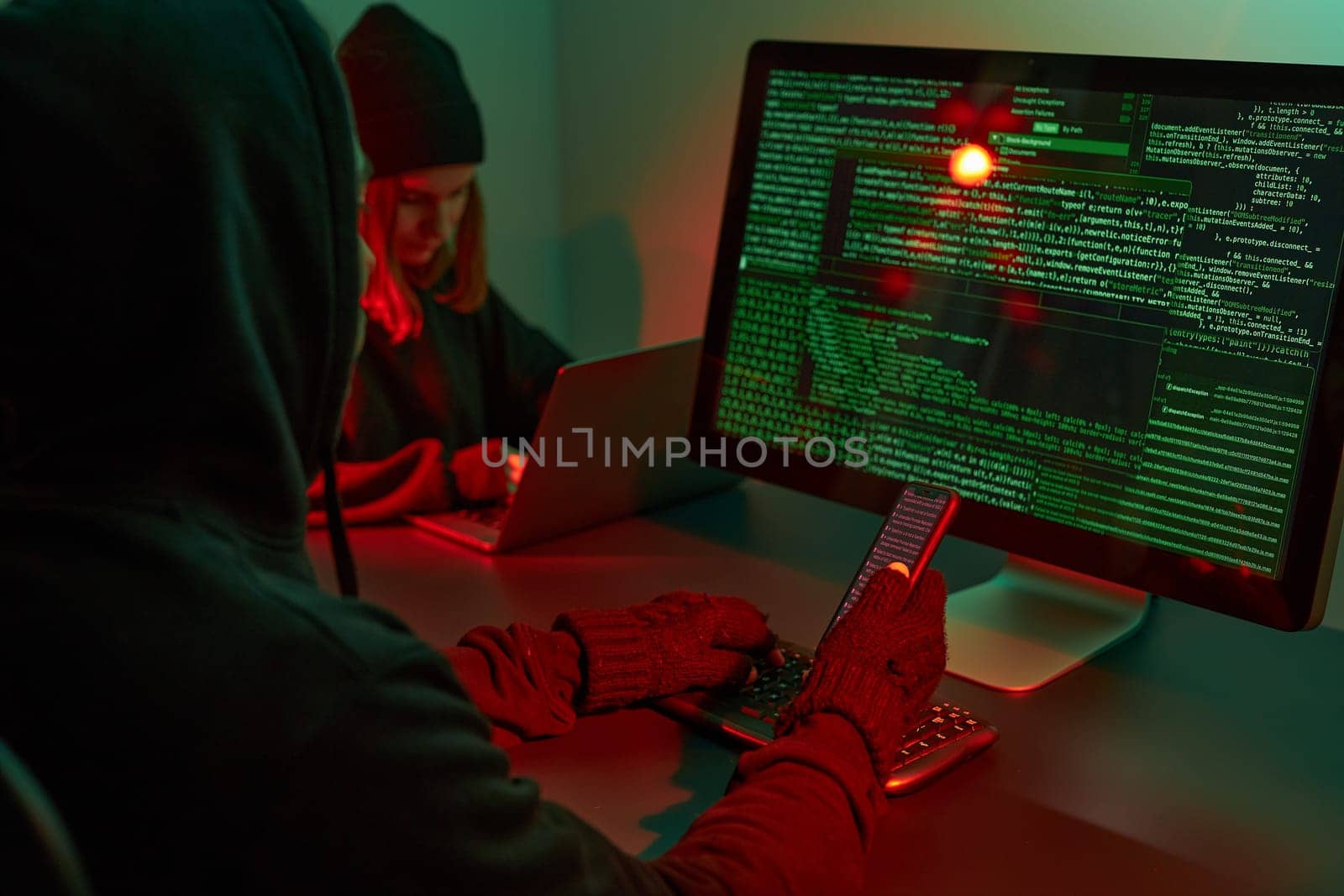 Anonymous people using computer and programming to break code. Cyber security threat. Internet and network security. Access to private information. Anonymous hackers using technology to access to password and encrypted data. Cyber attack