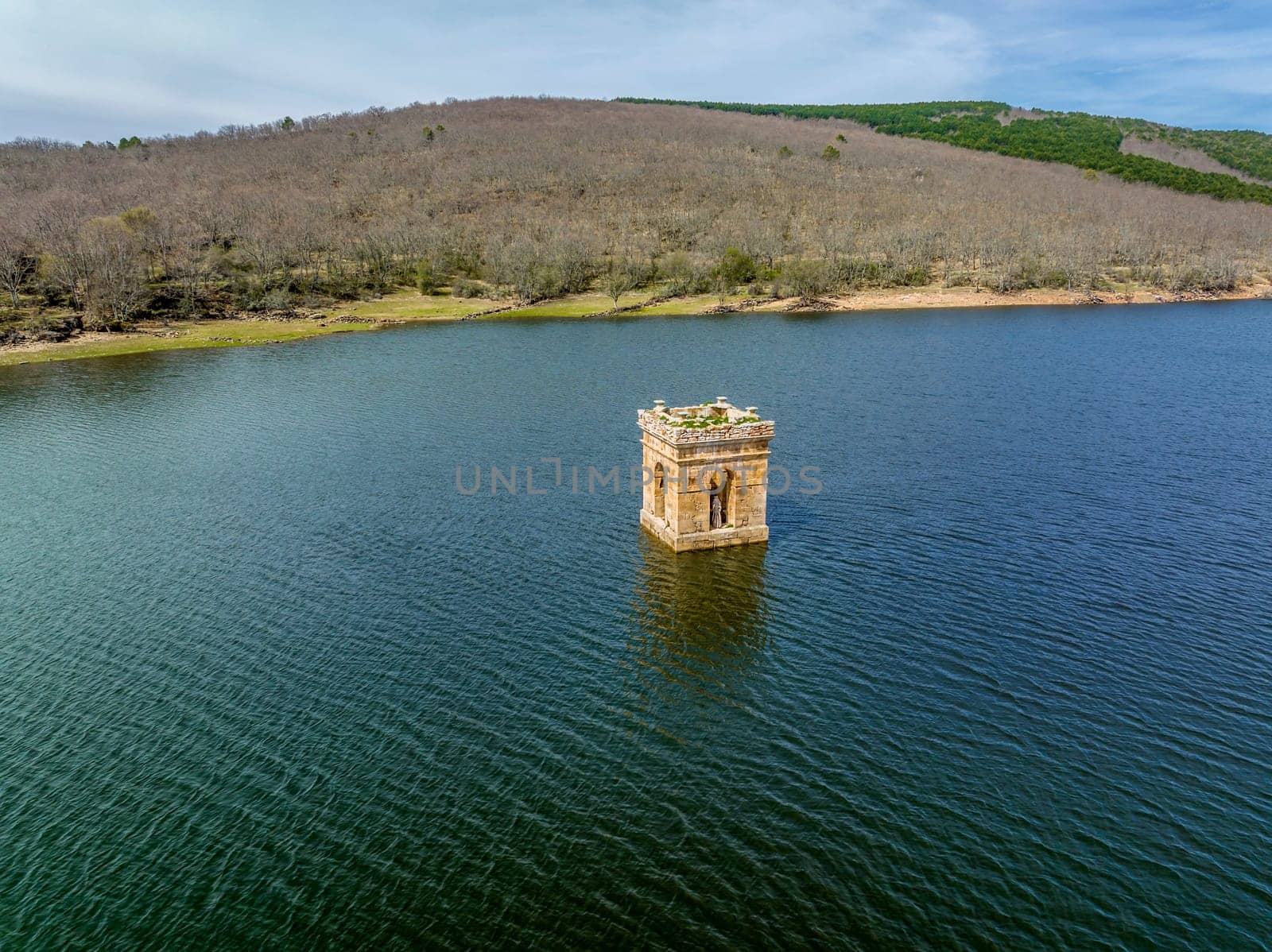 Cuerda del Pozo reservoir on the Duero river view of the bell tower of the church of La Muedra Soria province
