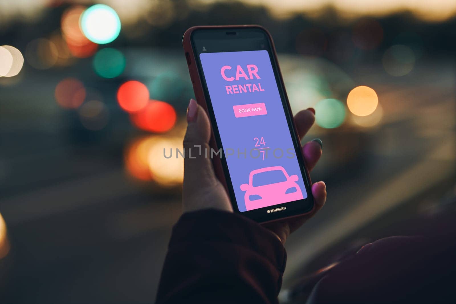 Woman renting car online using mobile app on smart phone. Person booking car using mobile application. Arranging ride in downtown city street. Car sharing. Car sharing service on mobile. City traffic lights at night in background