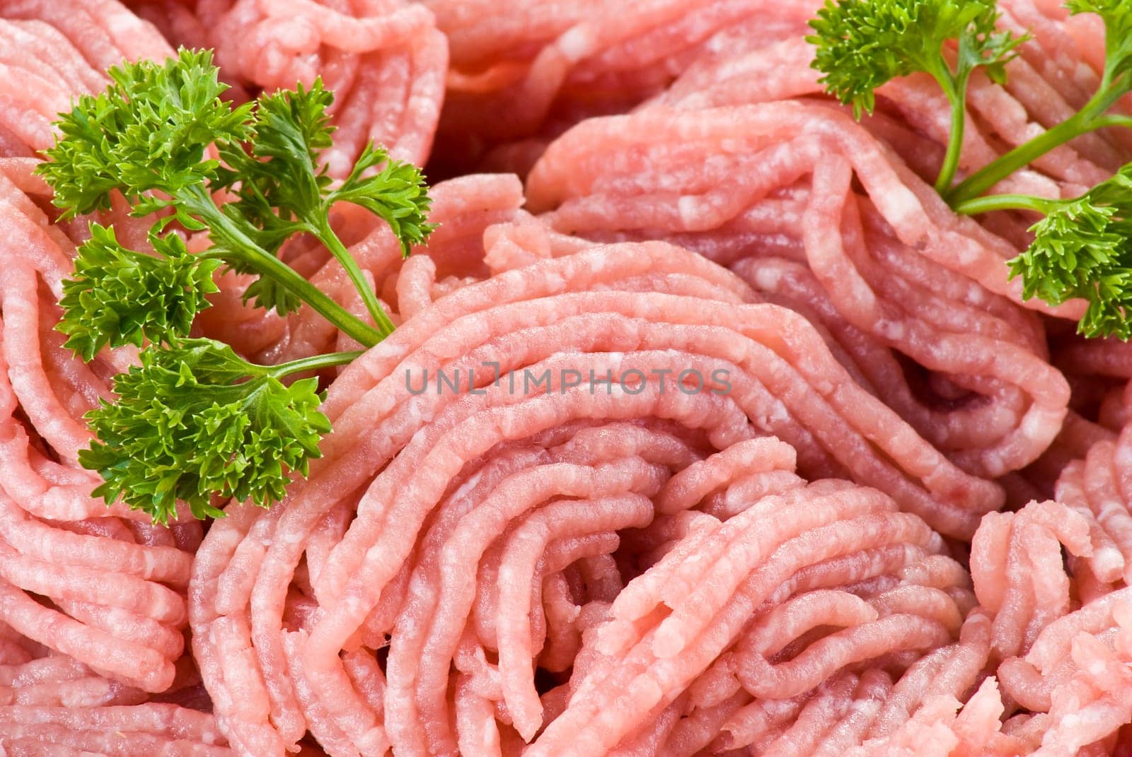 Closeup of minced pork with parsley