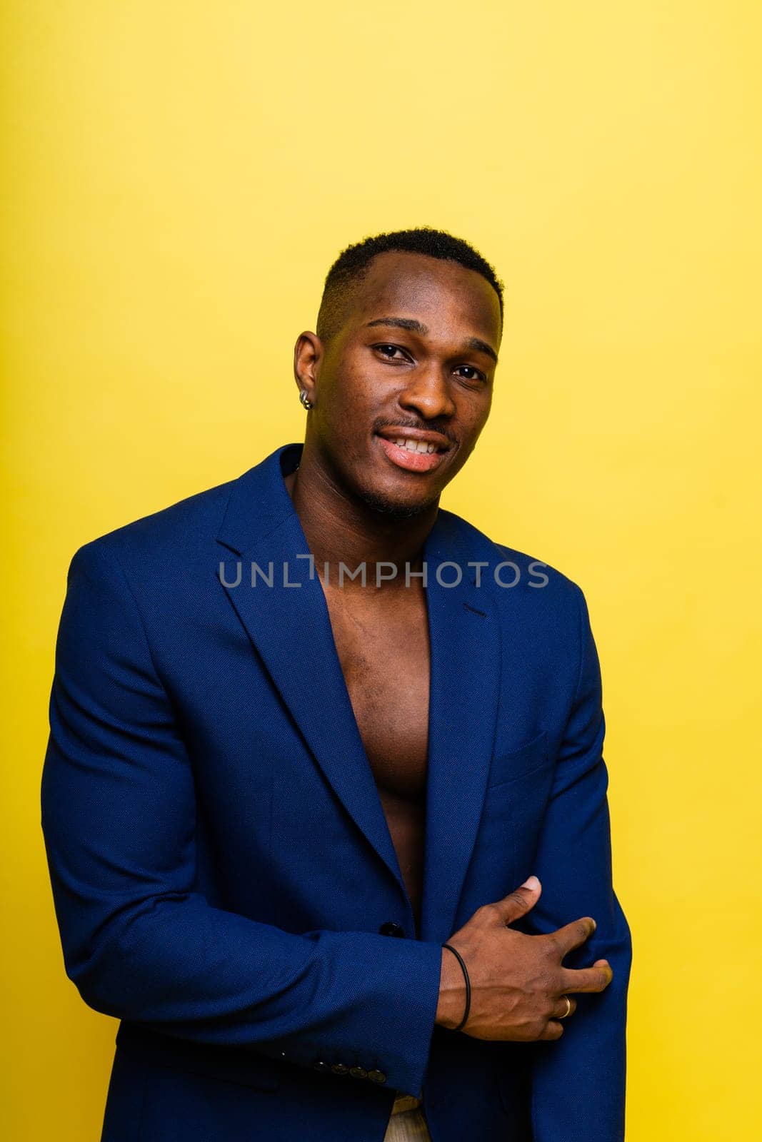 African American millennial businessman isolated on a studio background, successful male formal suit