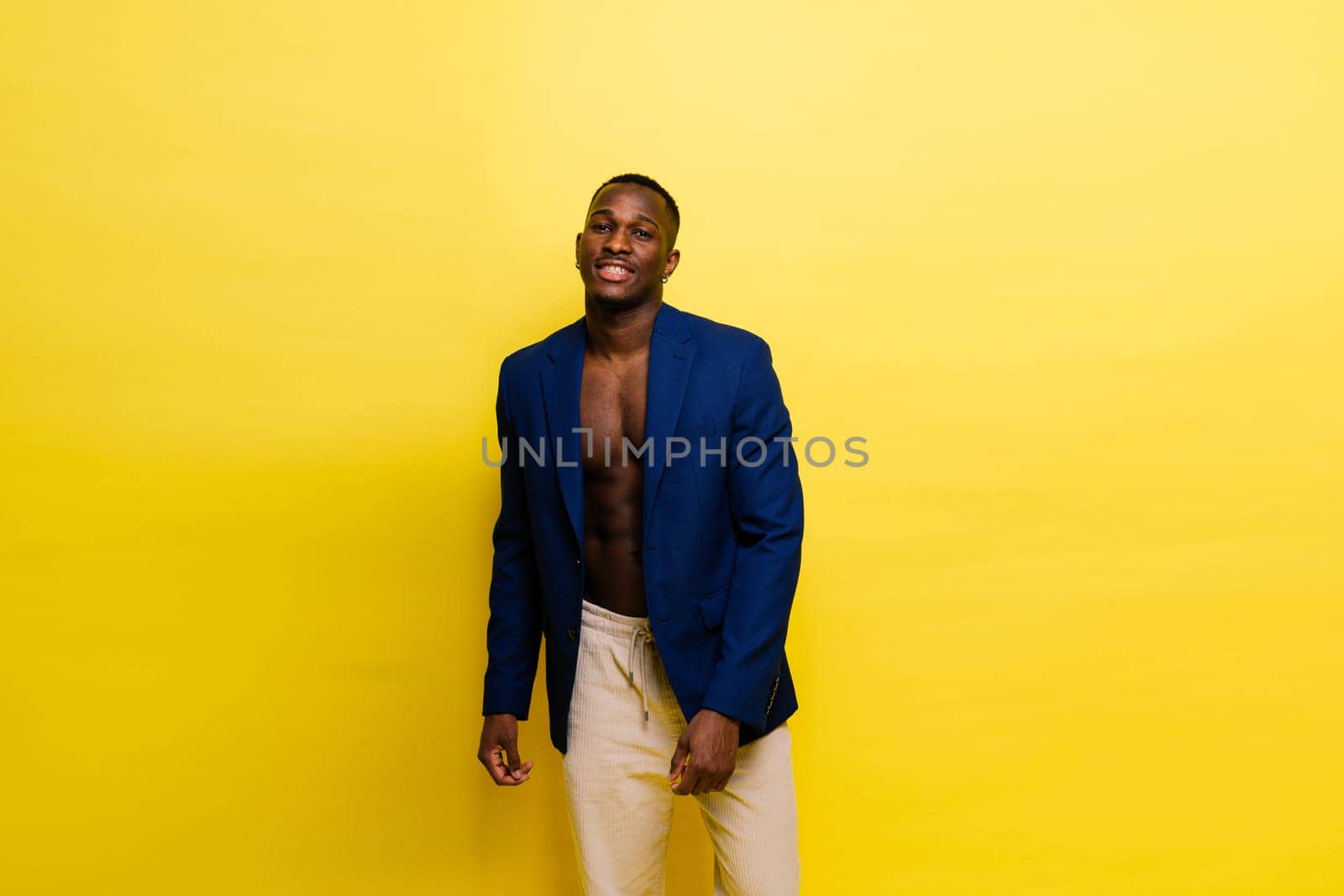 African American millennial businessman isolated on a studio background, successful male formal suit