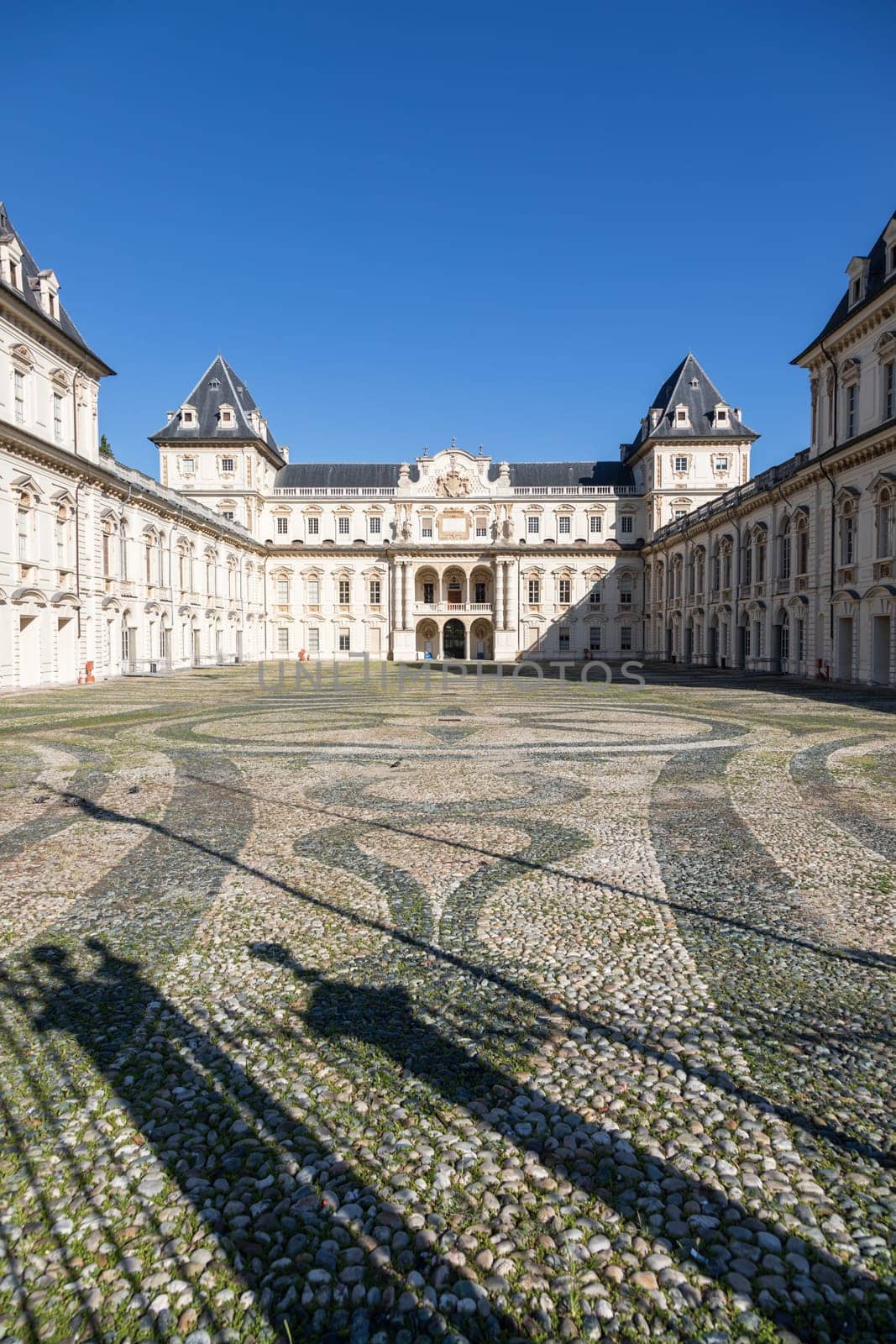 Turin, Italy - February 2023: castle exterior. Historical landmark with blue sky and daylight